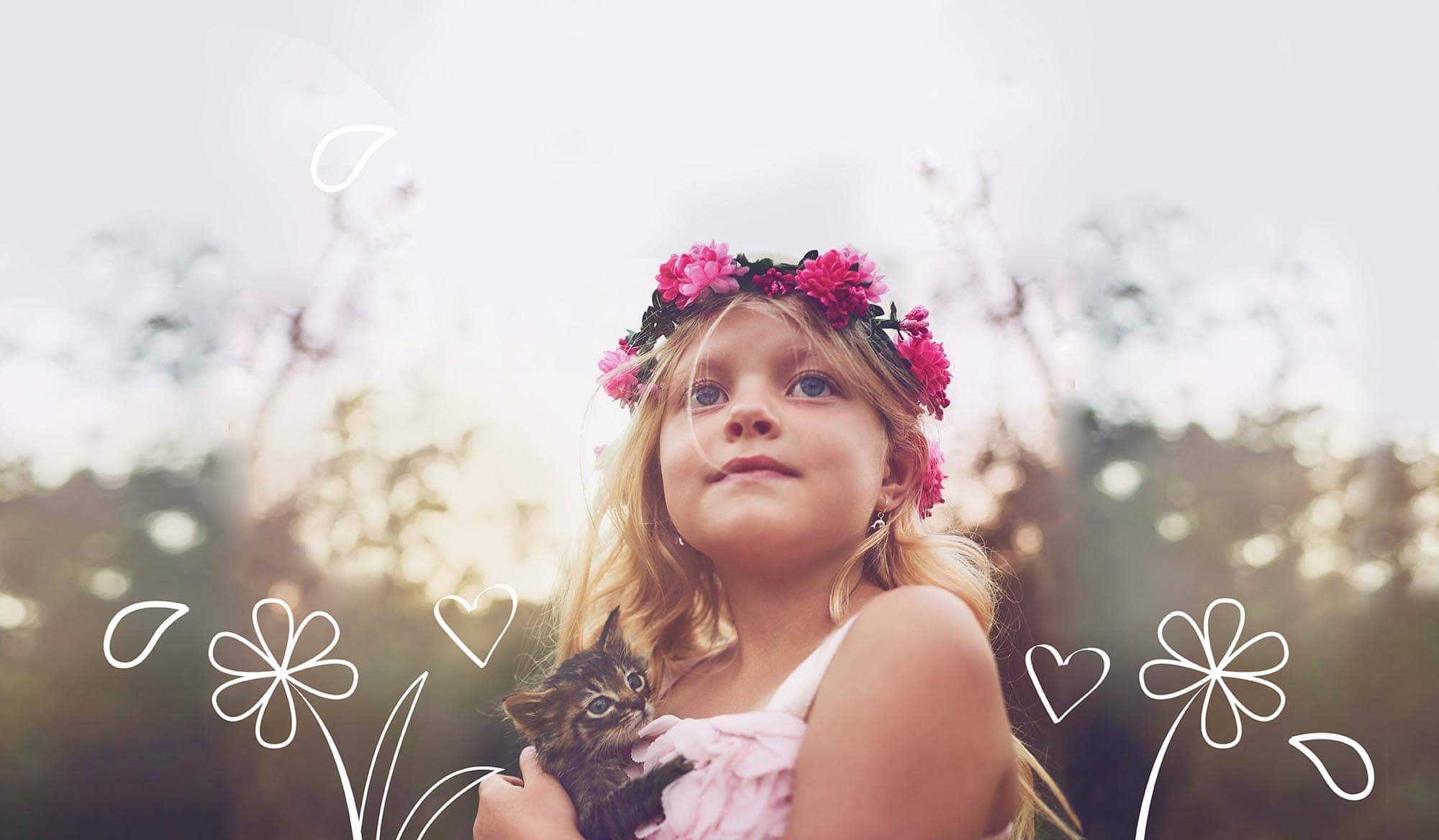 Looking for cat names? Here's our top ten list. A girl holds a young kitten.